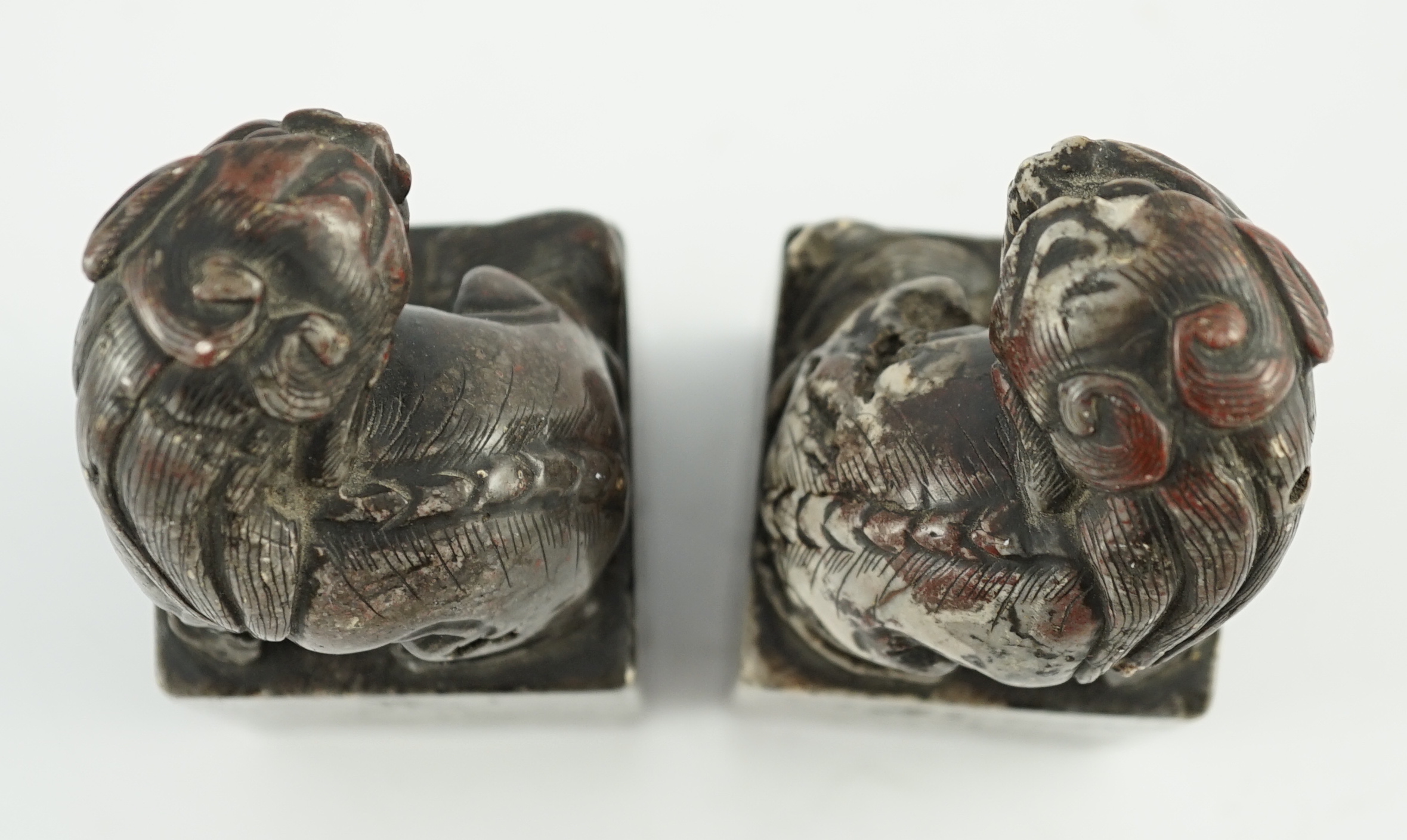 A pair of Chinese soapstone lion-dog seals, Qing dynasty